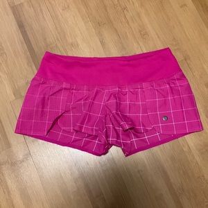 Brooks running shorts.